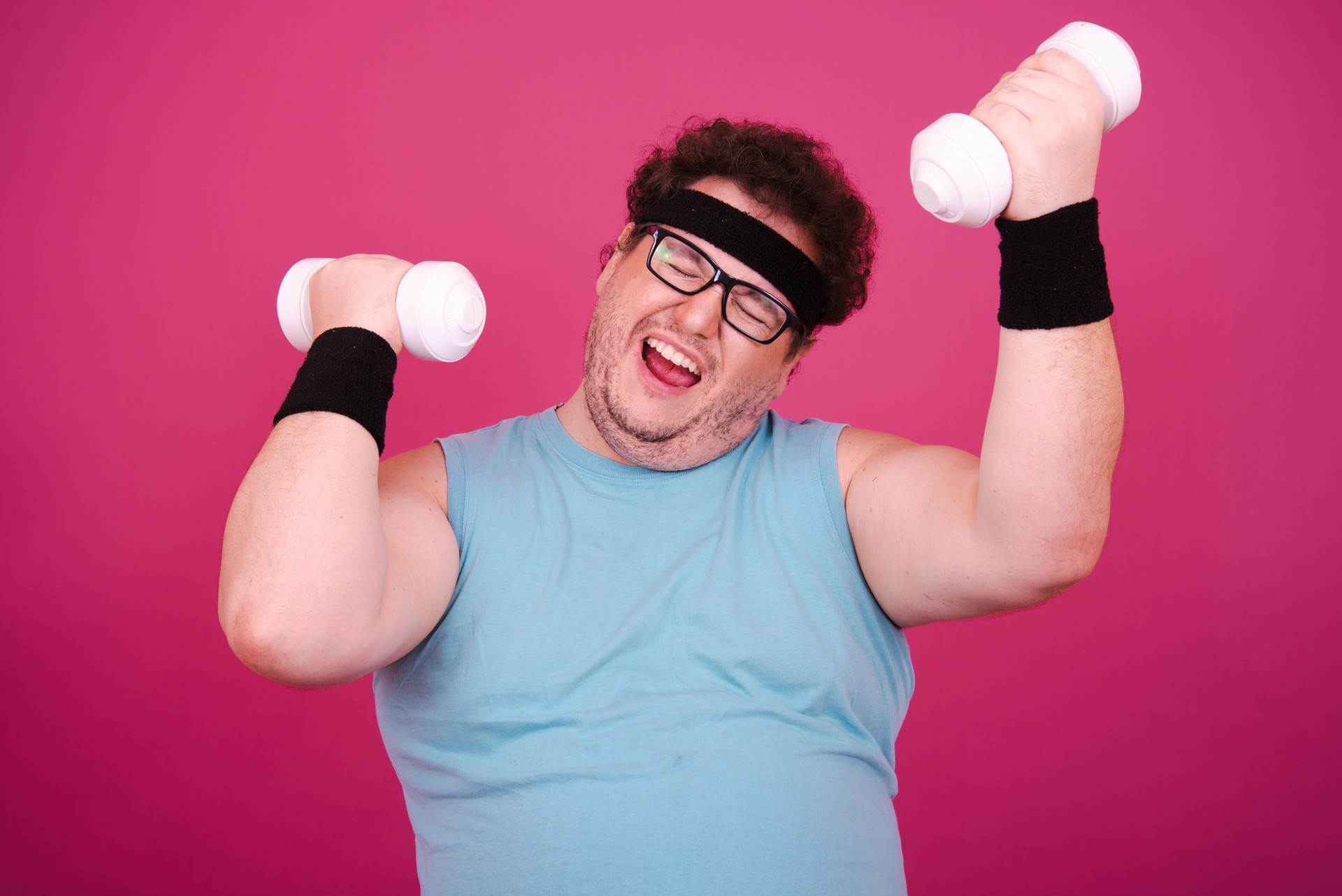 Funny fat man is engaged in fitness. Retro style.